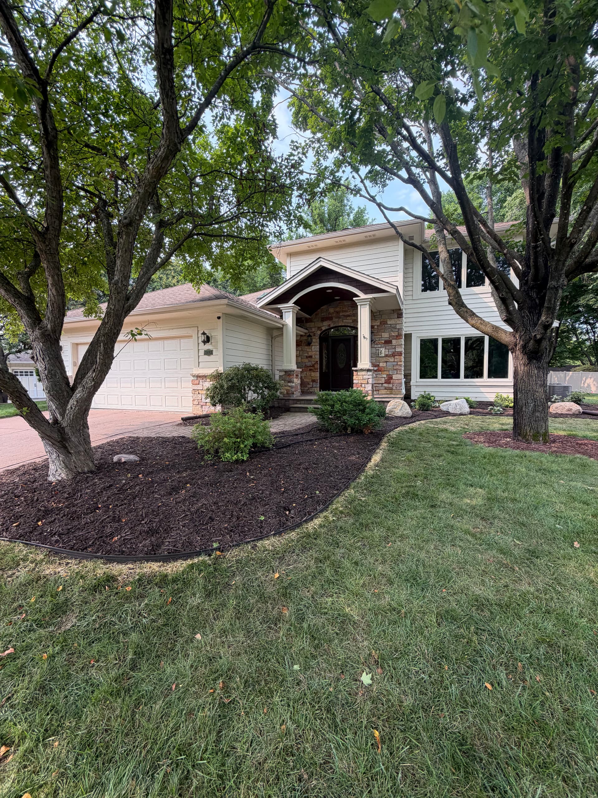 Gallery photos for Mulch, River Rock, and Metal Edging Refresh in Eden Prairie: Image #2