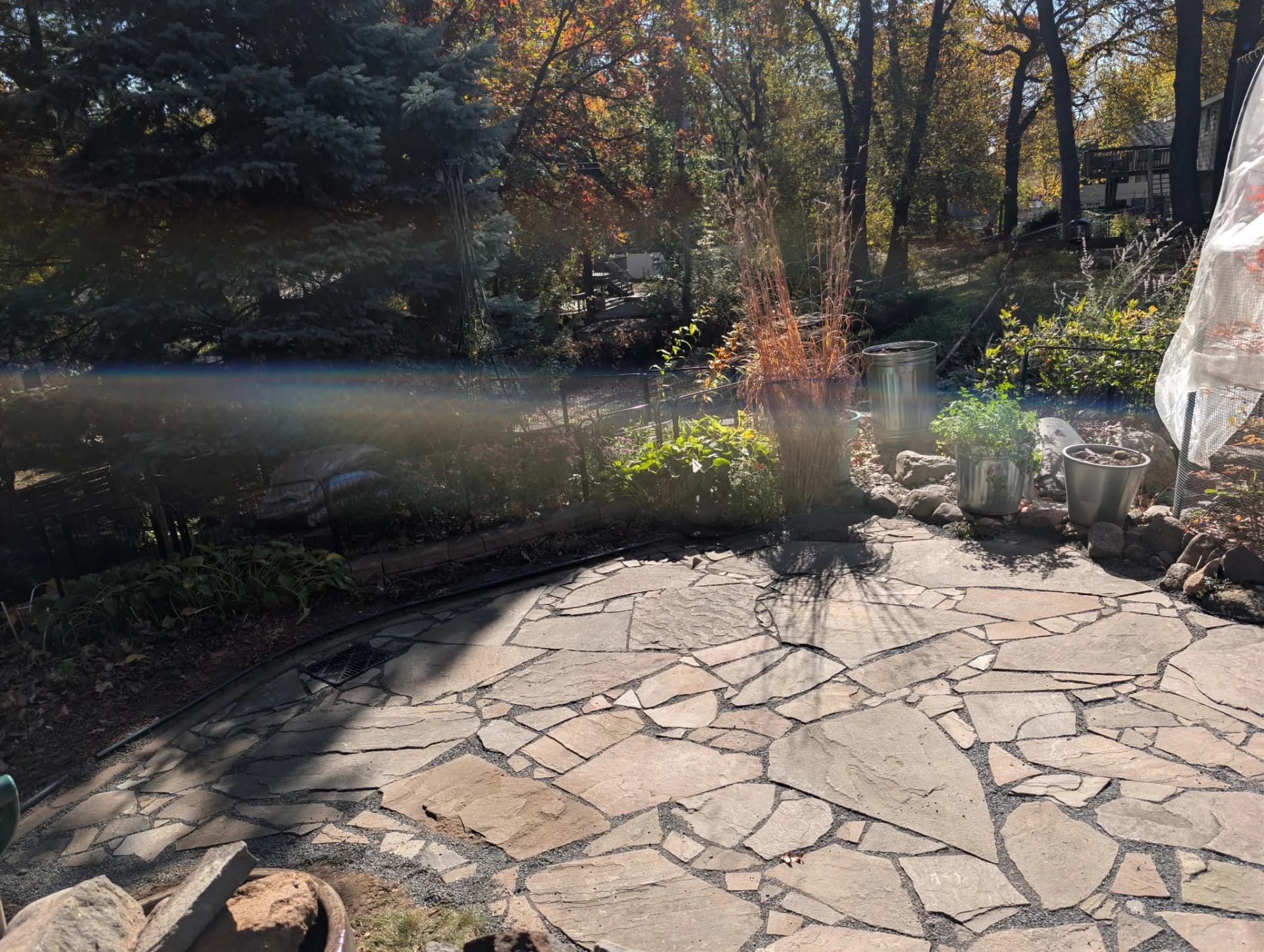 Gallery photos for Flagstone Patio With Black Granite Joints and French Drain: Image #1