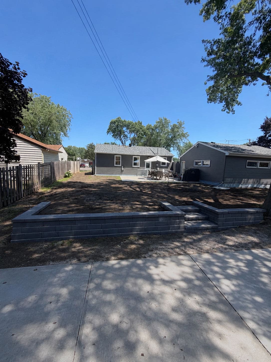 Project 45-Foot Retaining Wall with Steps Built in Richfield image