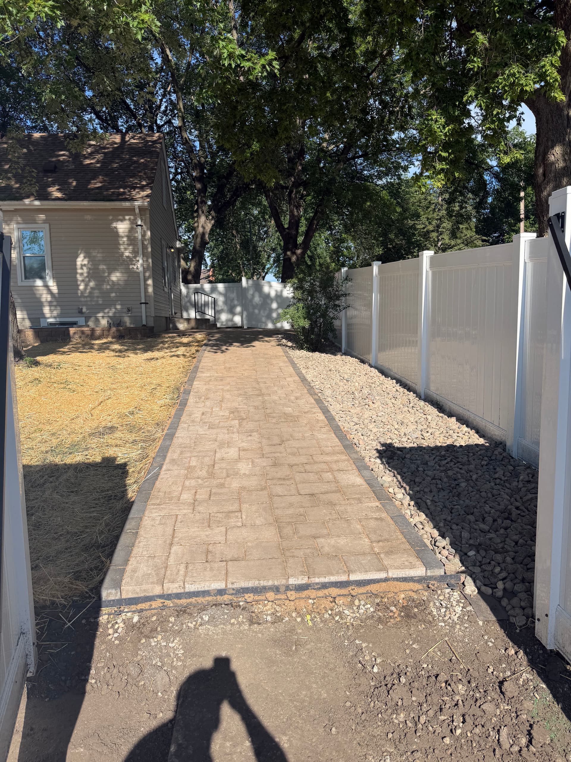 550 Sq. Ft. Patio Walkway and Retaining Wall Overhaul in Richfield