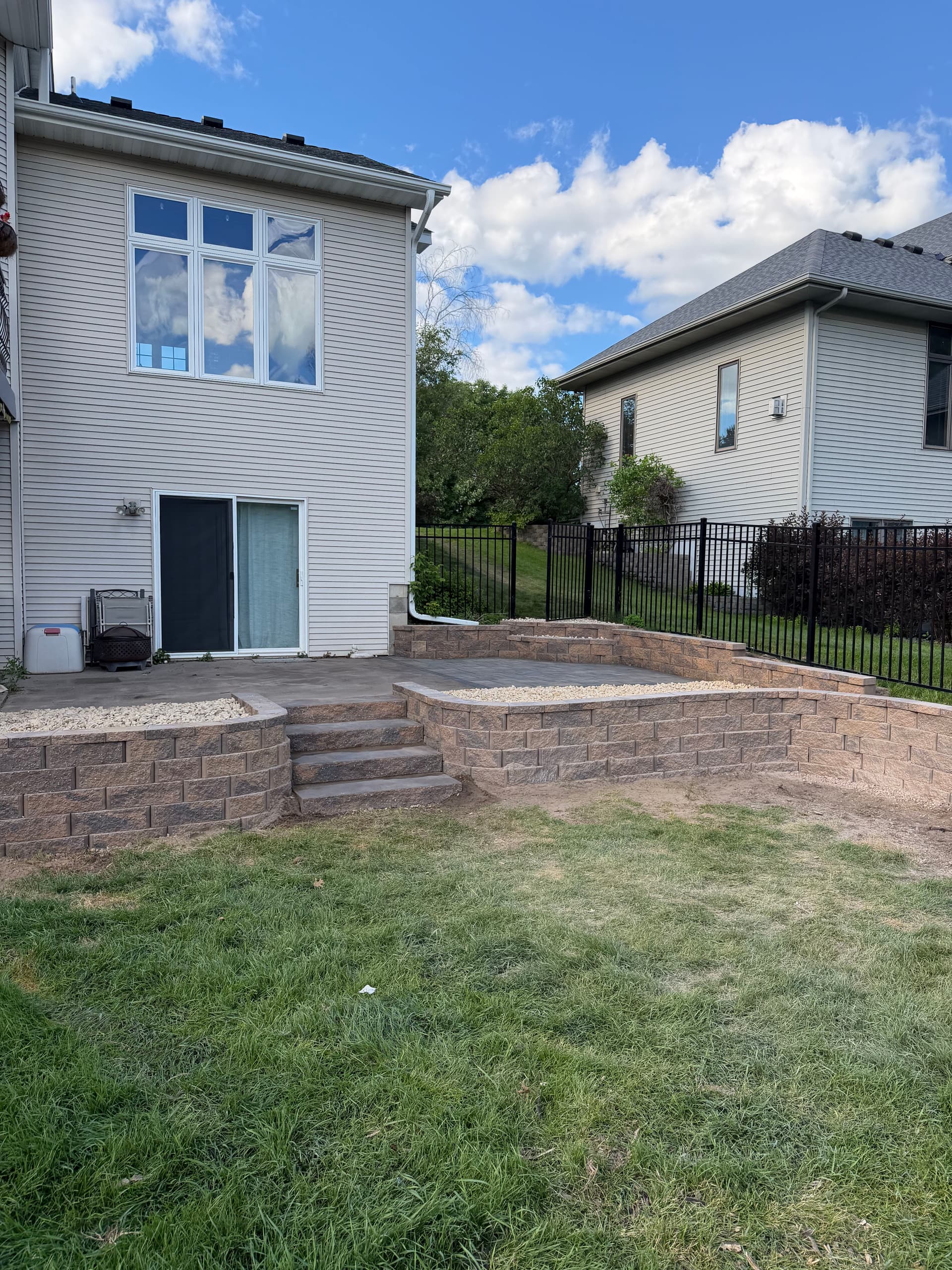 Andover Backyard Gets Retaining Walls, Patio and Rock Install