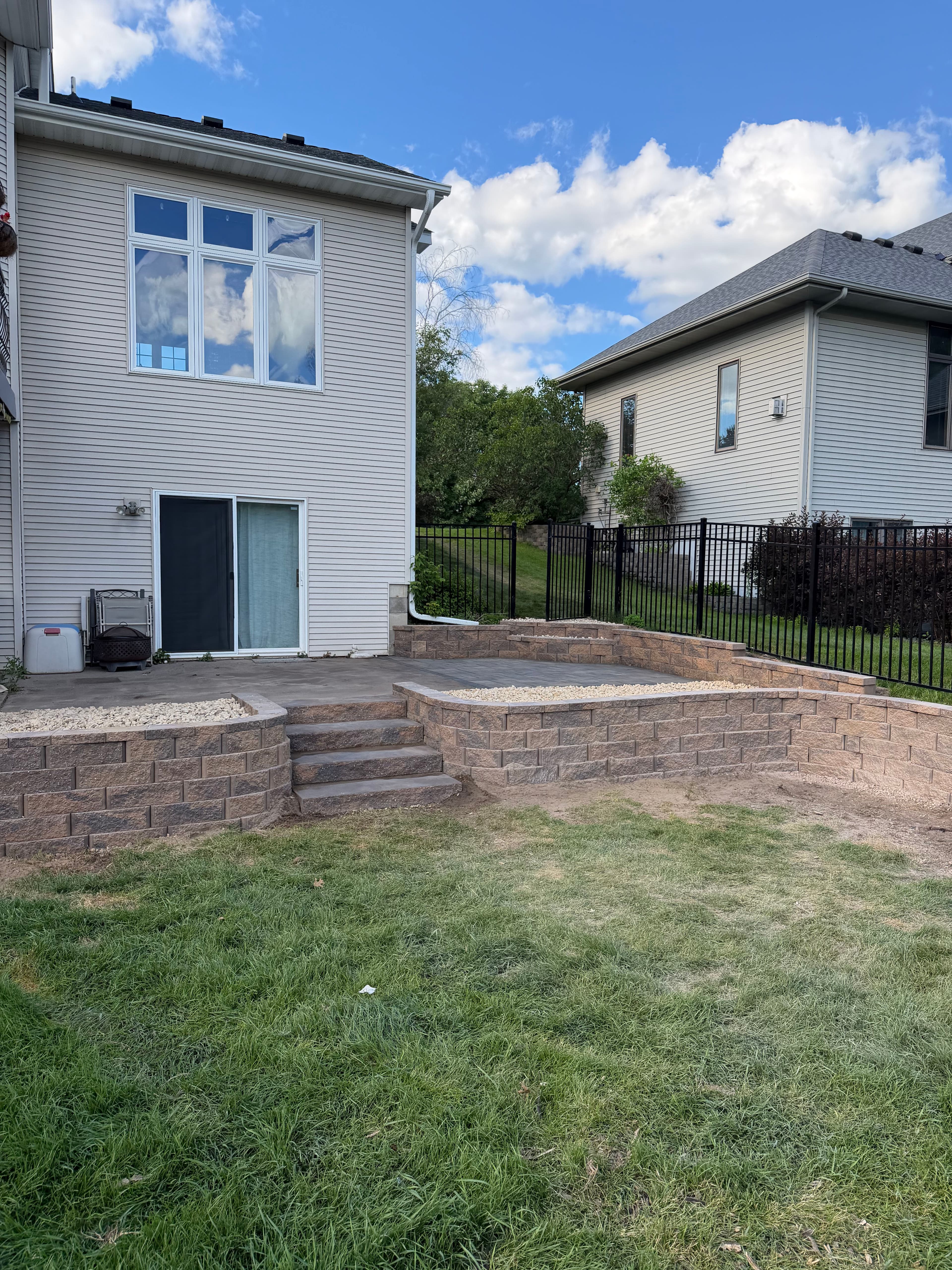 Project Andover Backyard Gets Retaining Walls, Patio and Rock Install image