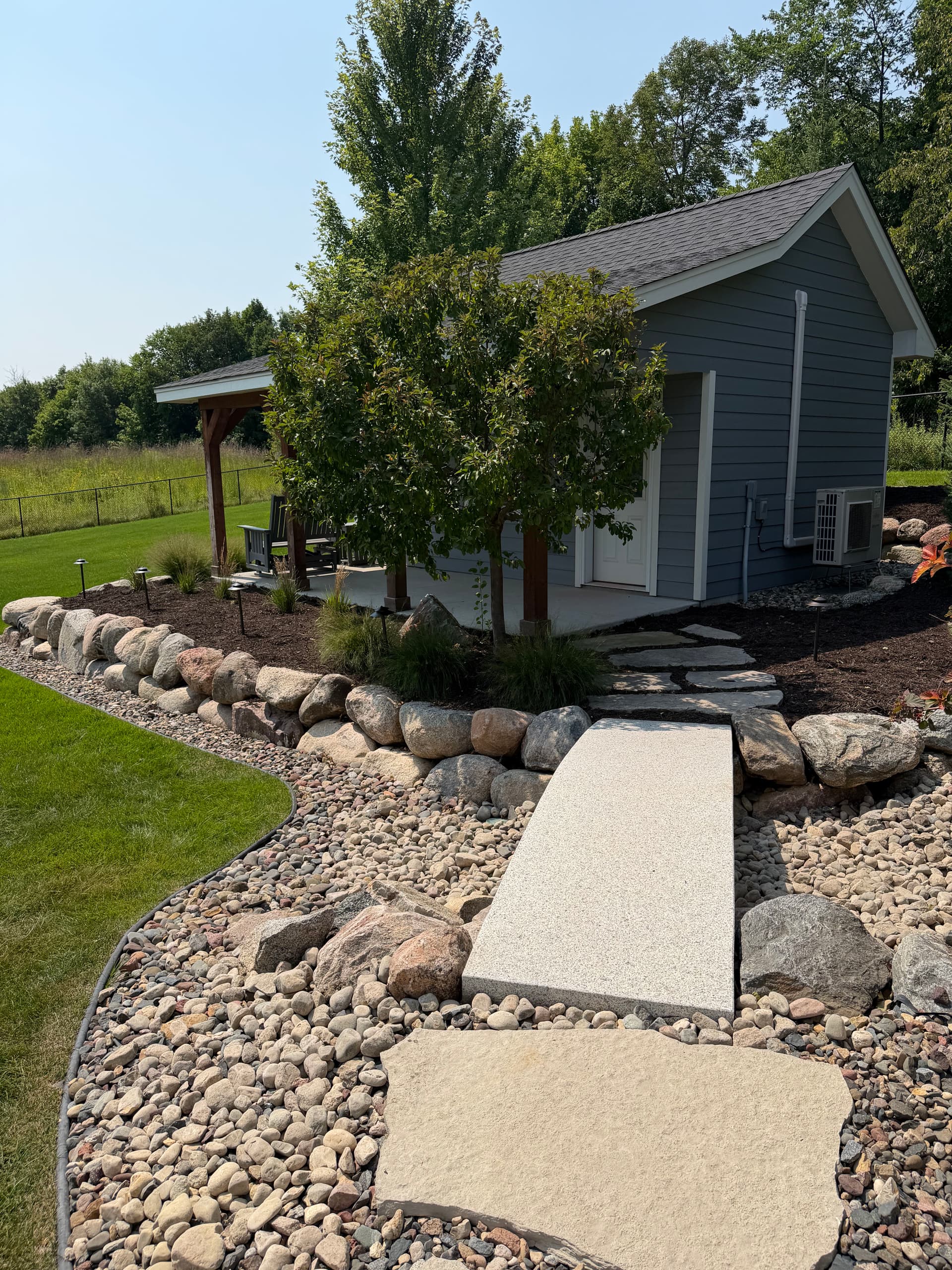 Fresh Mulch, Clean Beds, and Landscape Lighting Done Right