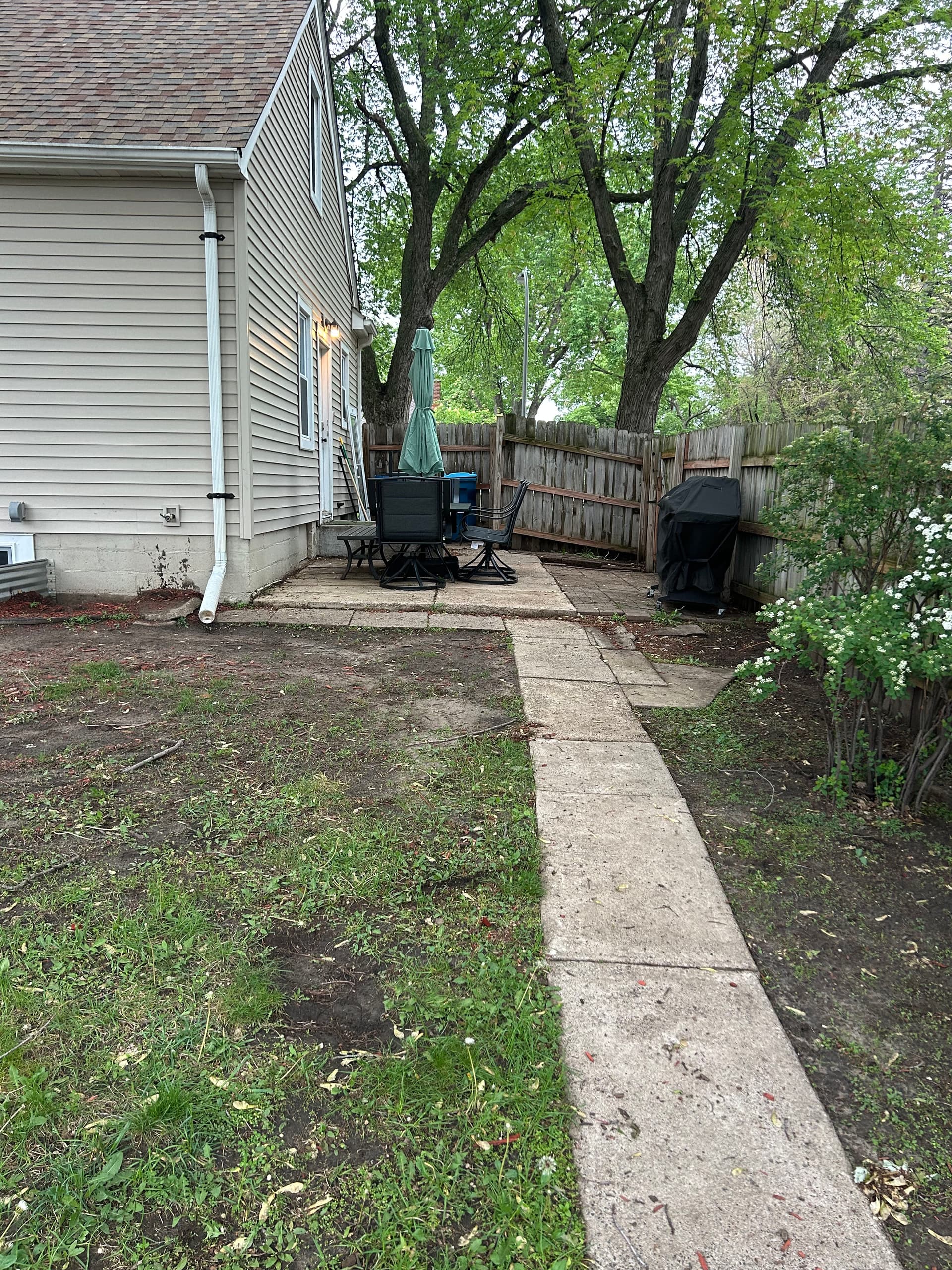 550 Sq. Ft. Patio Walkway and Retaining Wall Overhaul in Richfield