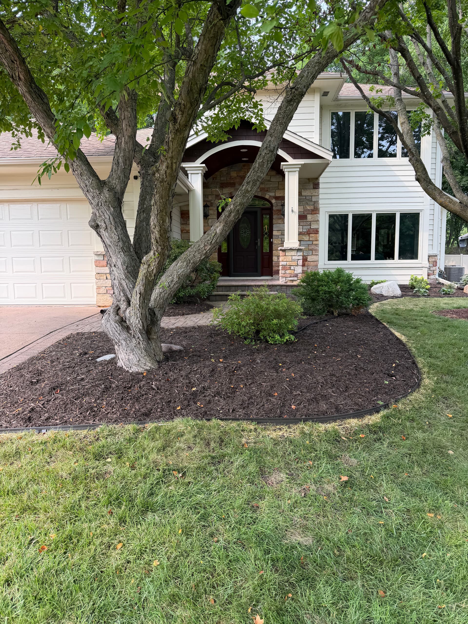 Gallery photos for Mulch, River Rock, and Metal Edging Refresh in Eden Prairie: Image #1